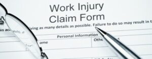 work injury clam form being filled out