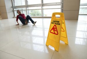 man on floor from slip and fall injury