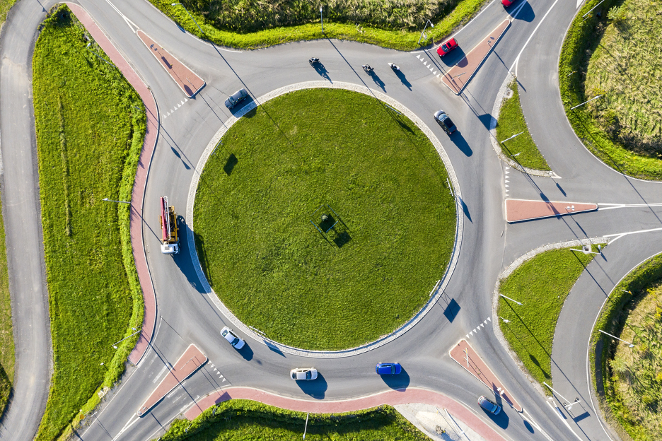 aerial view of roundabout with cars
