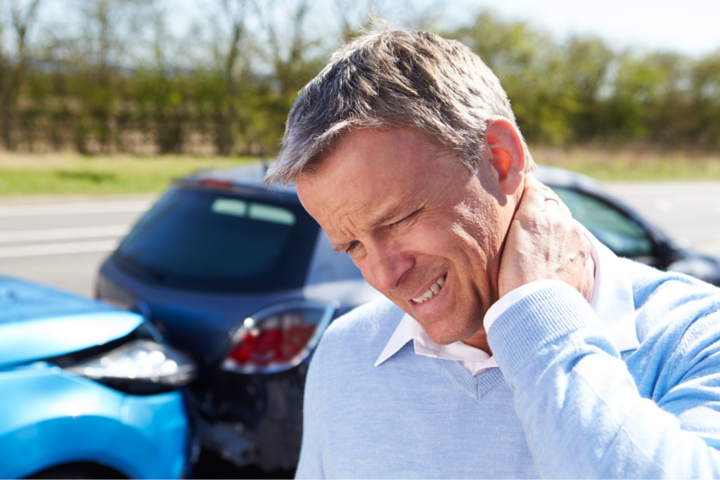 man-holding-neck-from-personal-injury-caused-by-vehicle-accident
