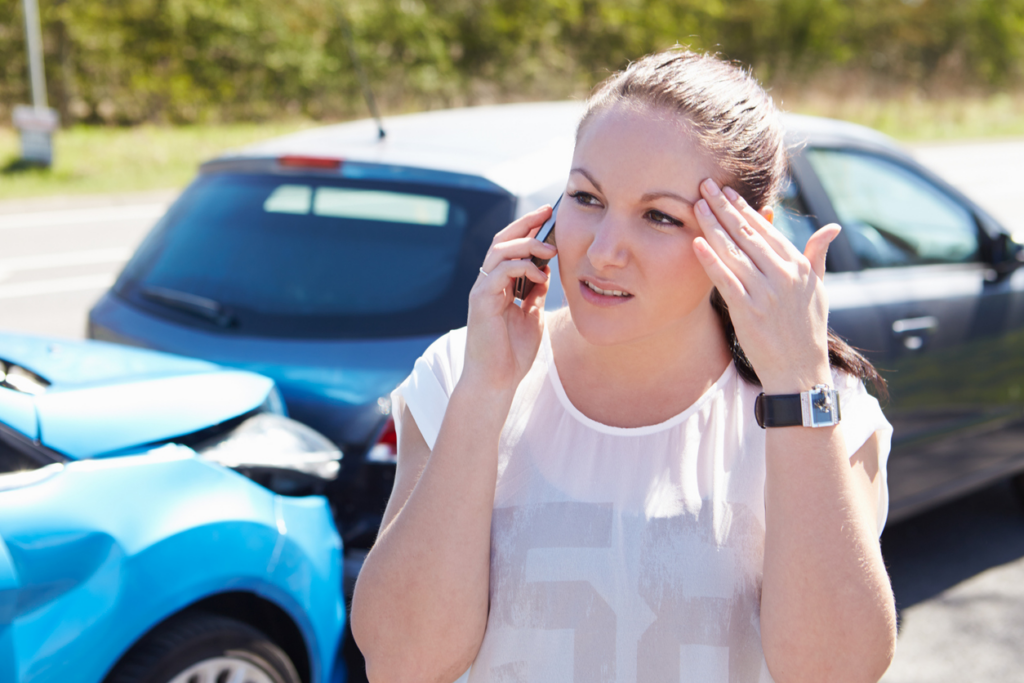 woman-making-call-after-headset-related-car-accident