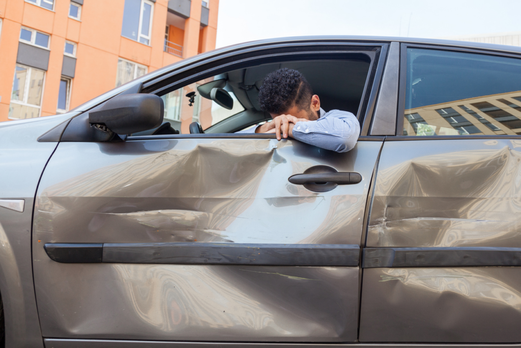 man-upset-in-car-after-SC-car-accident