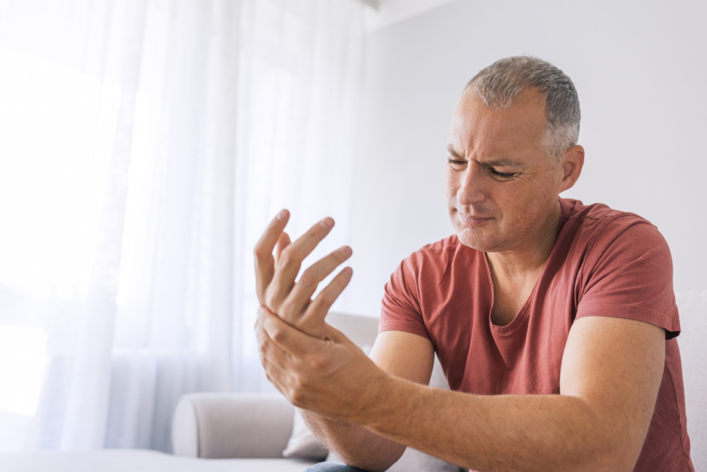 man-rubbing-wrist-he-thought-he-broke