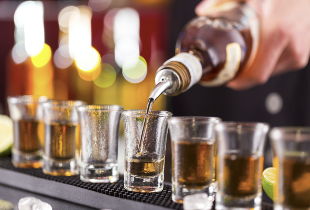 bartender pouring shots at SC establishment