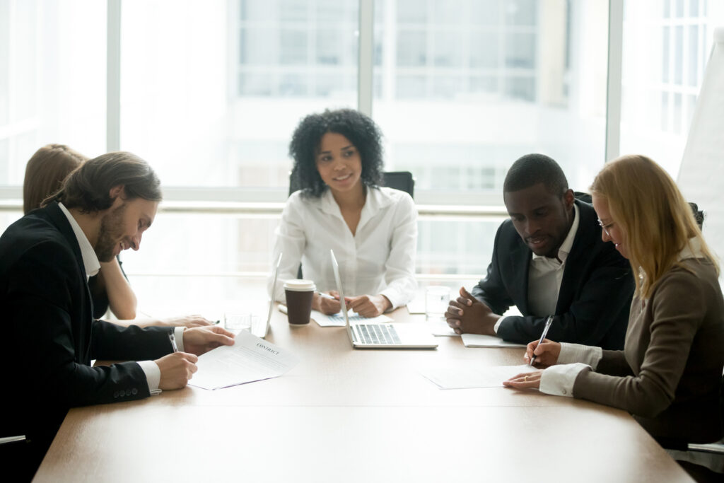 lawyers-and-clients-in-mediation-meeting