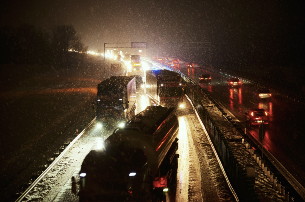 tractor trailer truck accident on snowy highway