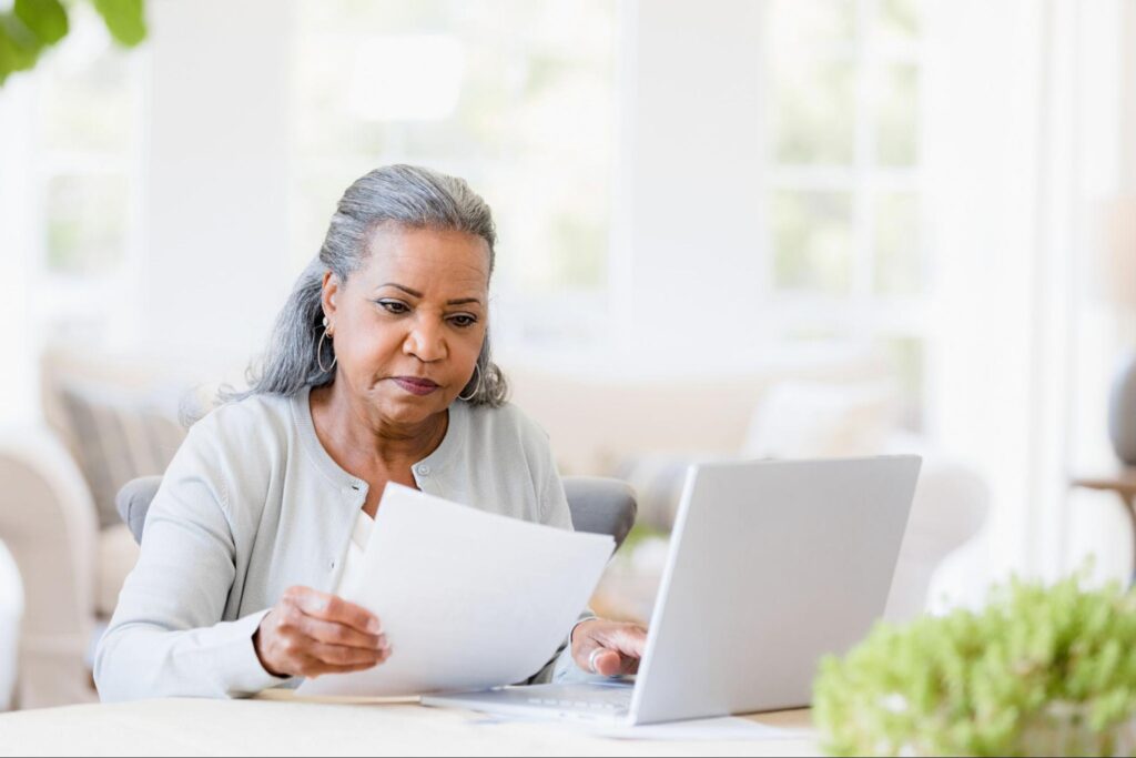 woman-reviewing-paperwork-and-trying-to-understand-wrongful-death-claim-in-SC
